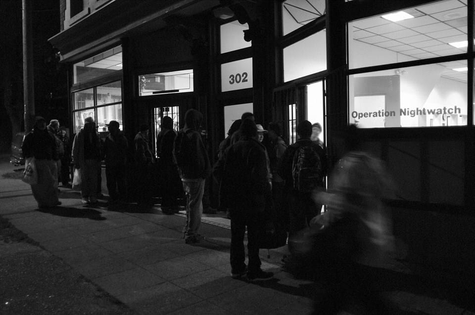 People waiting outside an Operation Nightwatch shelter