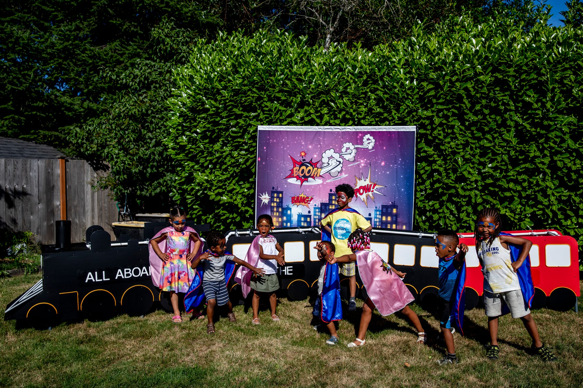 Kids in super hero costumes