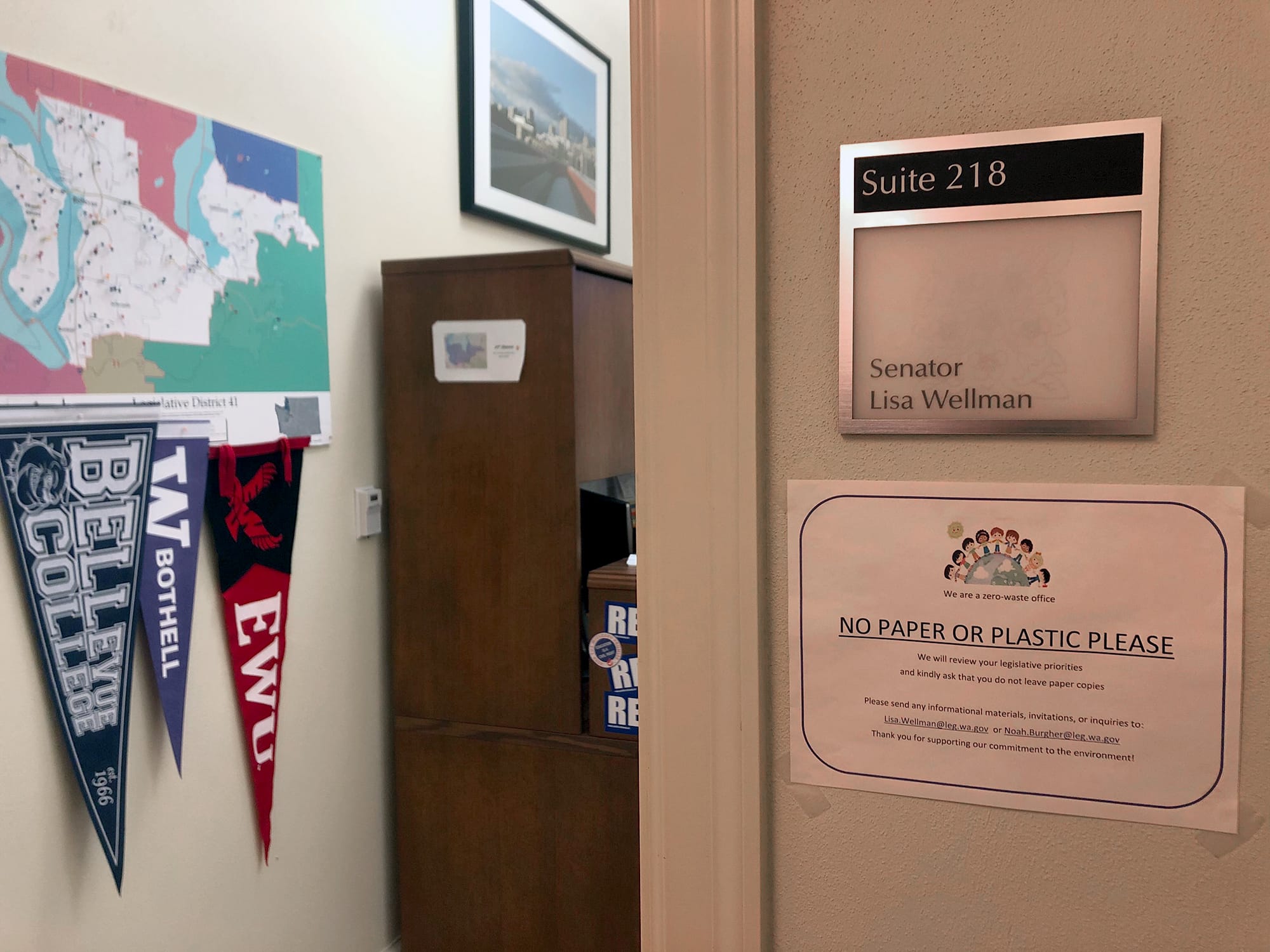 A sign on the door of a legislative office.