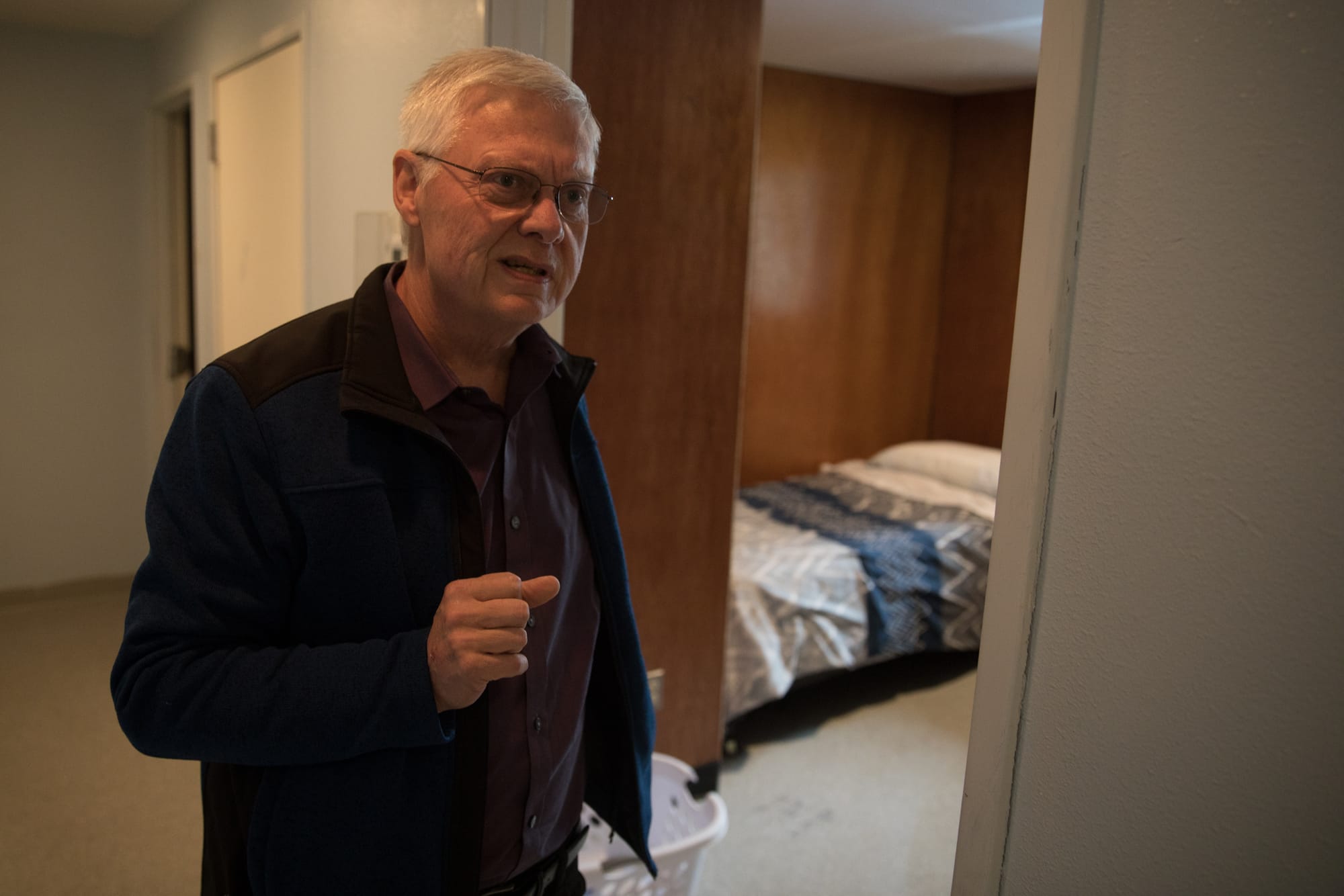 Secret Harbor President and CEO Brian Carroll near a bedroom inside of the organization's homes in Burlington, Washington. (Matt M. McKnight/Crosscut)