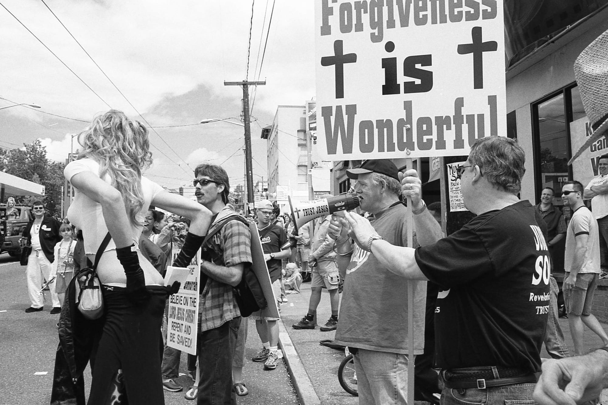 Evangelicals protesting gay rights get feedback from a participant during a 2004 Capitol Hill parade.