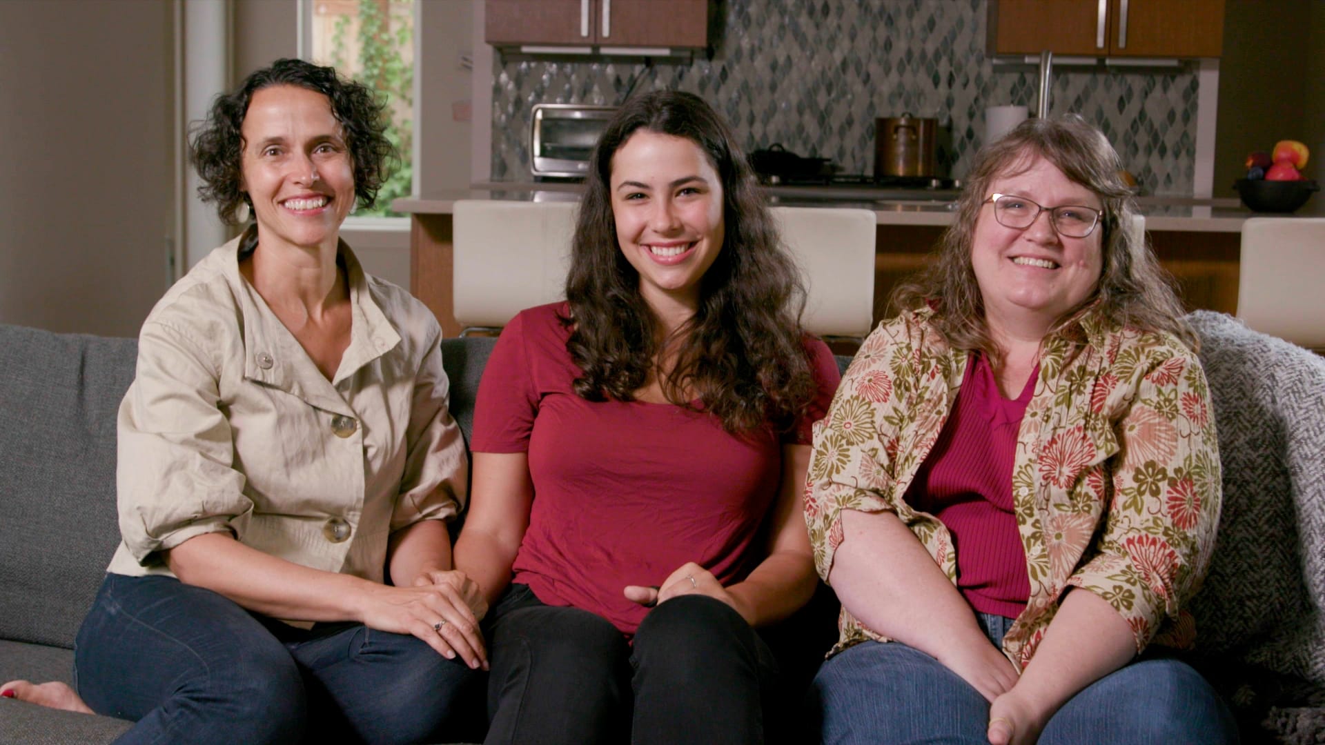 Bella with her mother and case manager