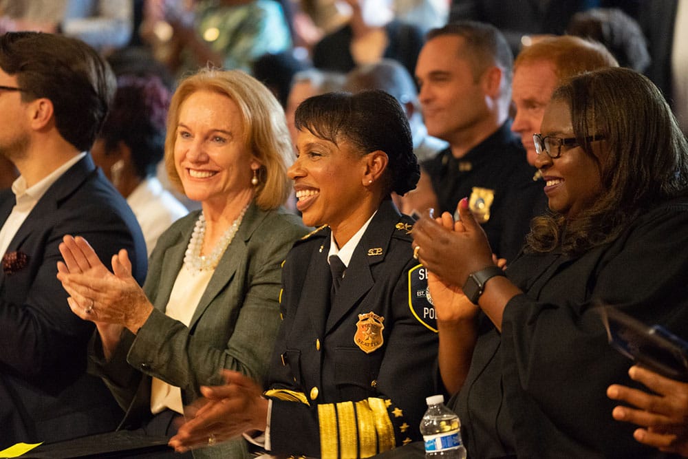 Carmen Best awaits her final swearing-in of the day.
