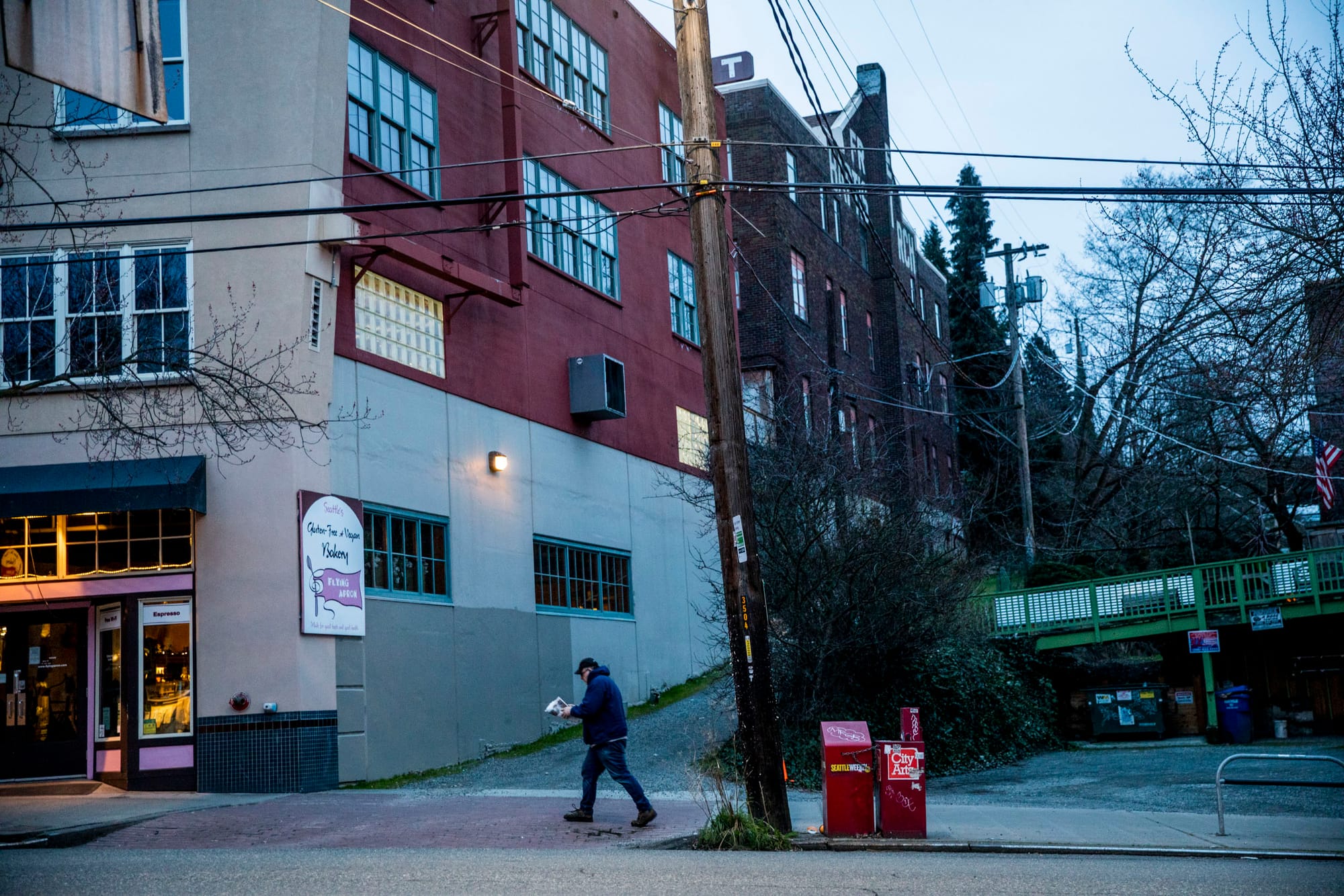 Doug Latta, 58, completes his final delivery route for the Seattle Weekly.