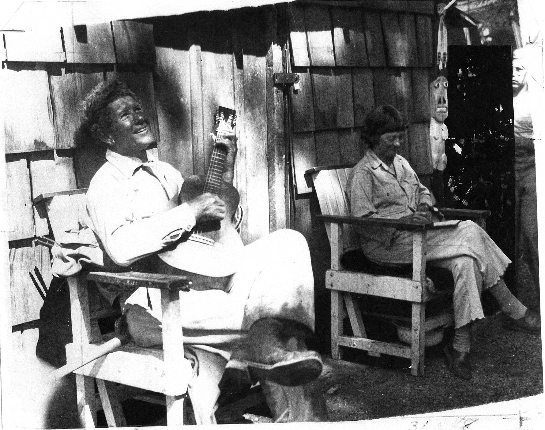Farrar plays and sings at Camp Orkila on Orcas Island, while June writes in her journal.