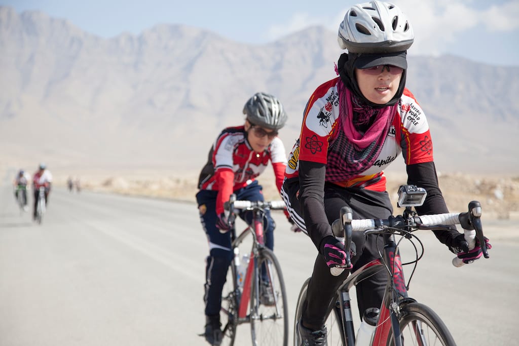 Zahra leads the pack on a 2014 training ride with the Women’s National Cycling Team of Afghanistan