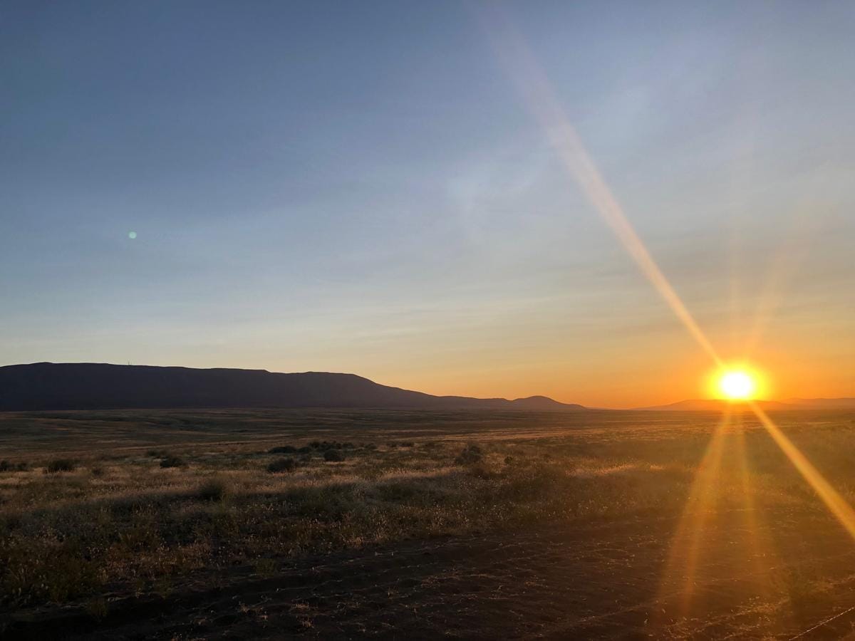 A sunrise over Rattlesnake Mountain