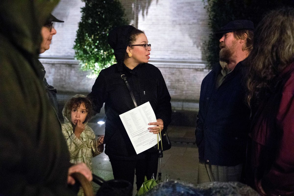 Harris-Talley with daughter Cora, 6, meets with housing activists after the Mass for the Deceased Homeless at Seattle’s St. James Cathedral.