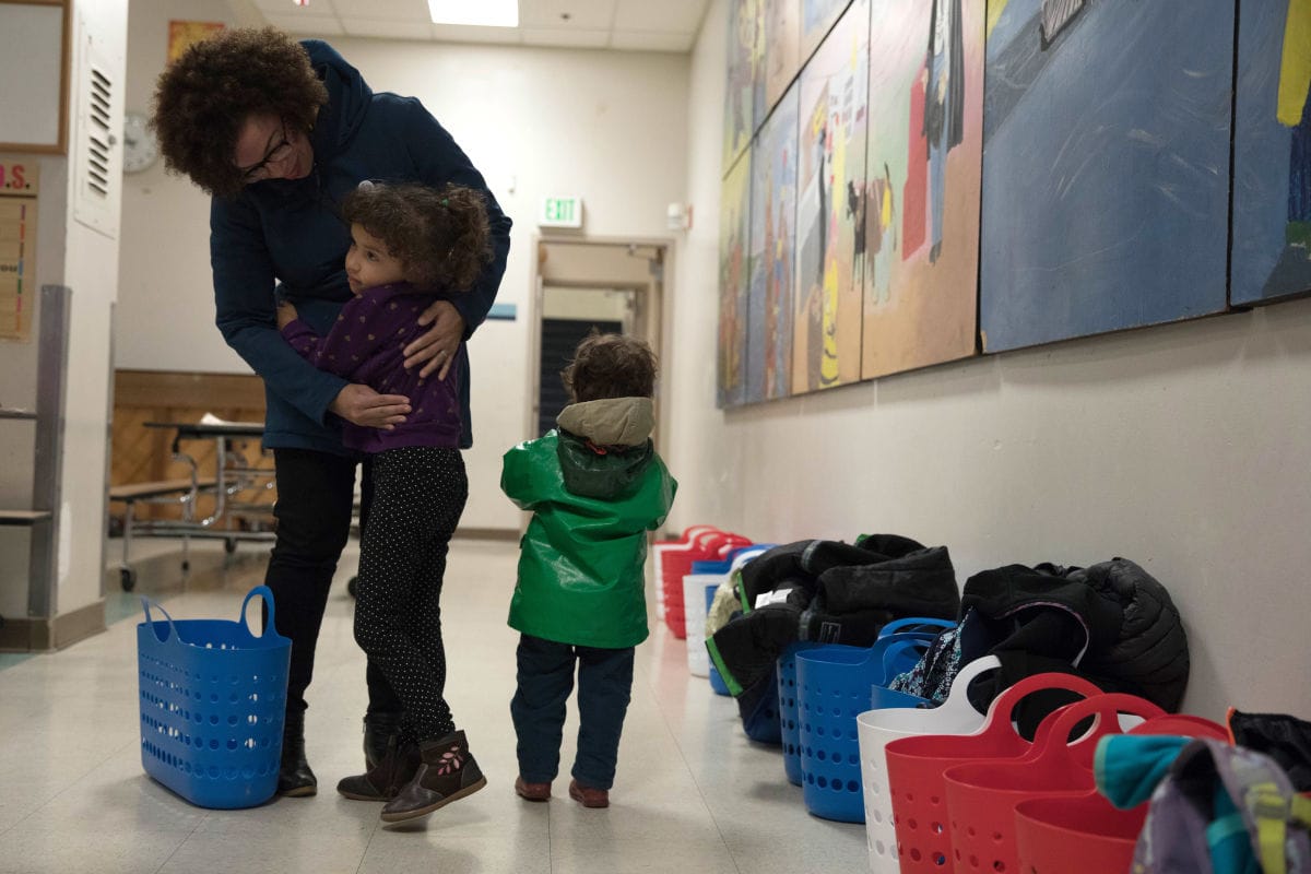 Harris-Talley hugs her daughter goodbye at school.