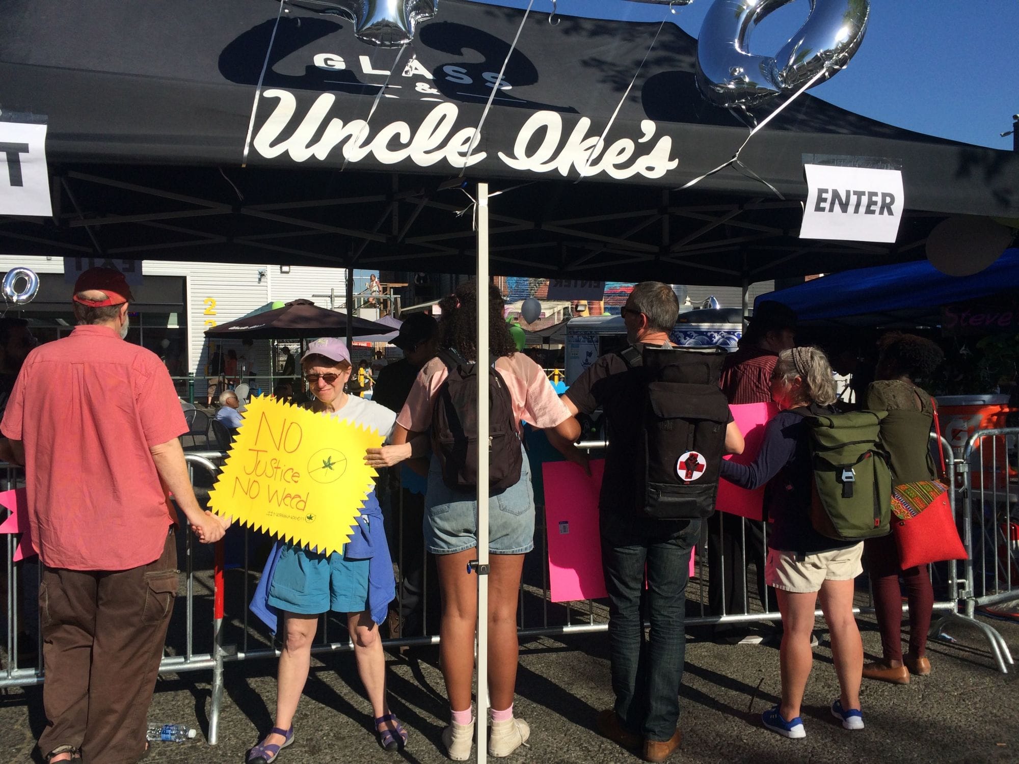 A protest outside Uncle Ike’s, a popular retail pot store in Seattle.