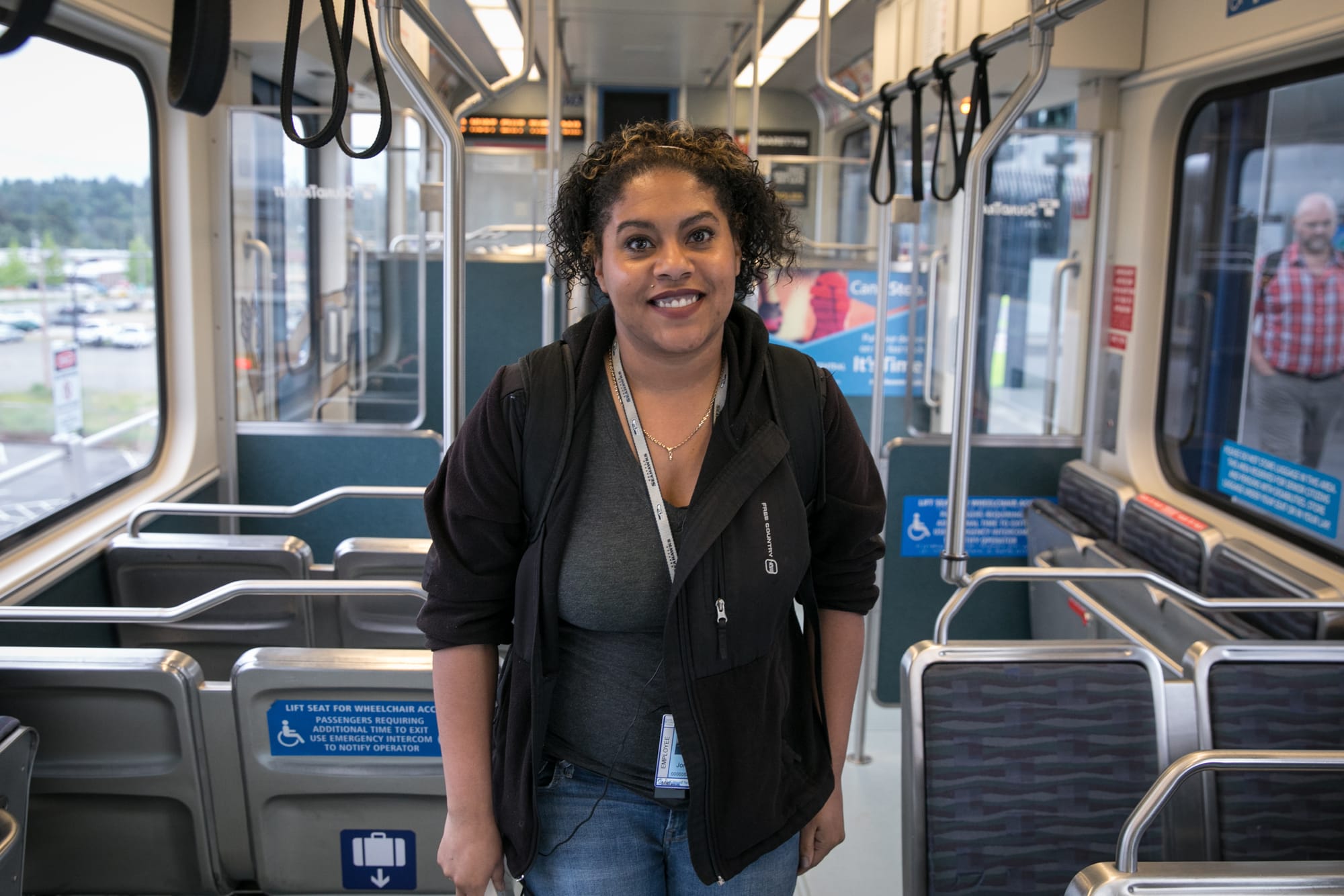 Woman riding on the Link light rail