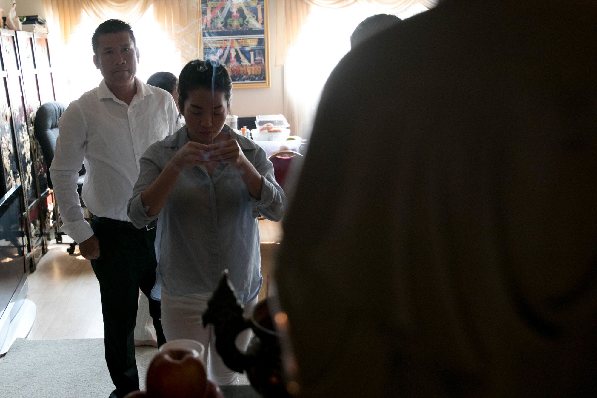 Xuyen Le, Tommy Le’s aunt, prays at Co Lam Pagoda Buddhist temple