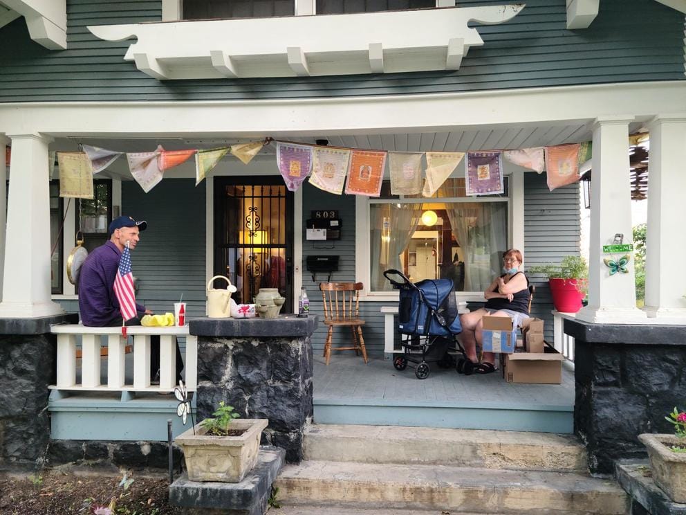 two people on a porch