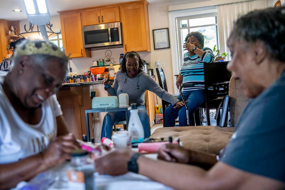 grandmothers paint their nails together