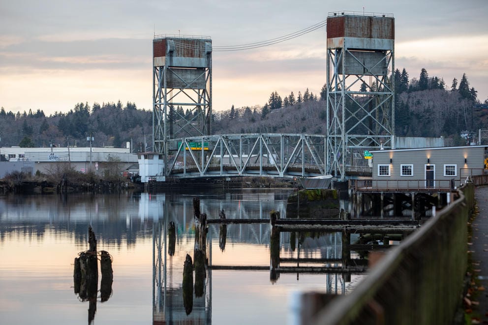 The Riverside Avenue Bridge reflects off the Hoquiam River.