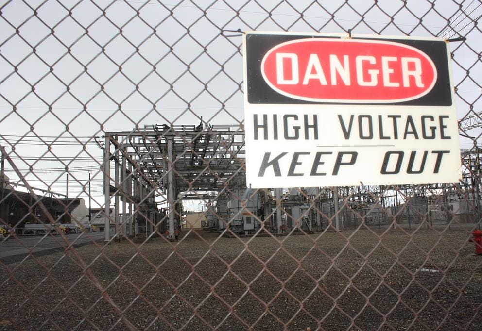 keep out sign on a fence