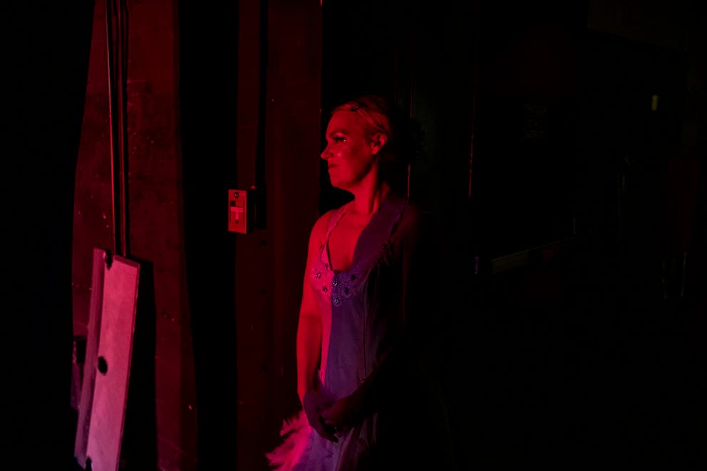 Diana in red light backstage