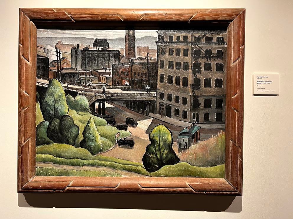 photo of a framed oil painting showing a historic view of Yesler Way