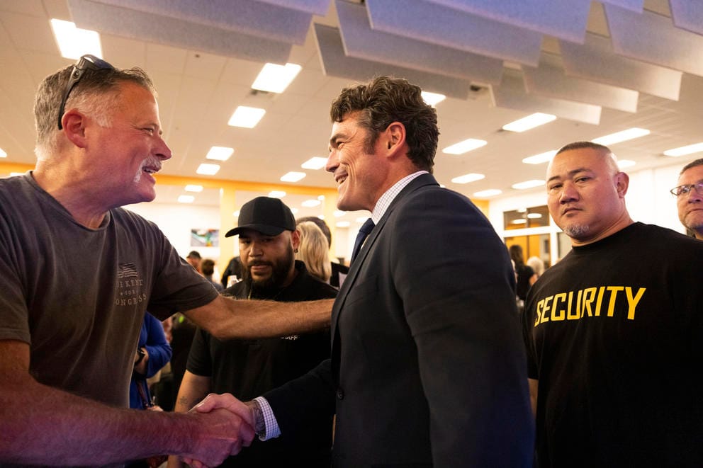 Republican candidate Joe Kent greets supporters