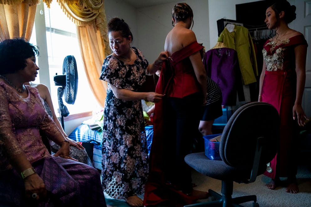 Nary adjusts a dress