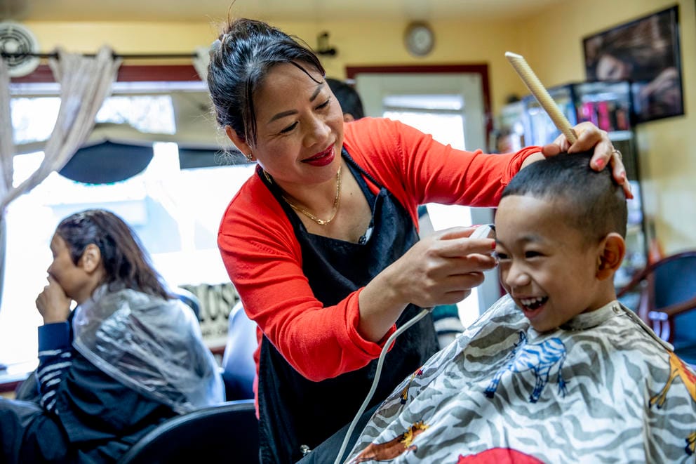 Nary cuts little boy's hair