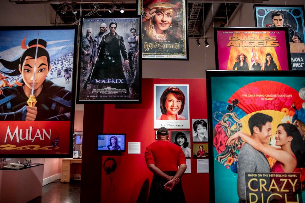 Movie posters hang from the ceiling