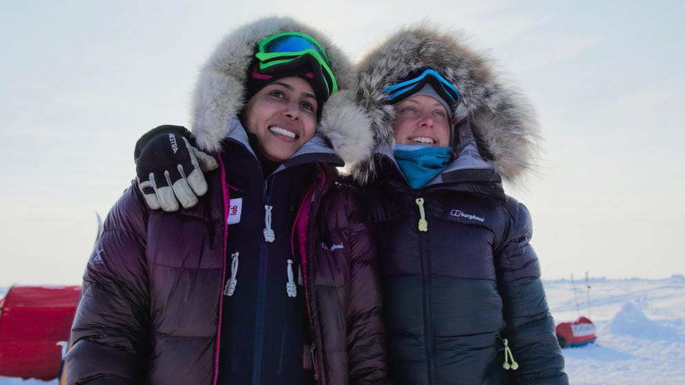 photo of two women in heavy snow gear