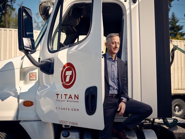 Man standing by a truck