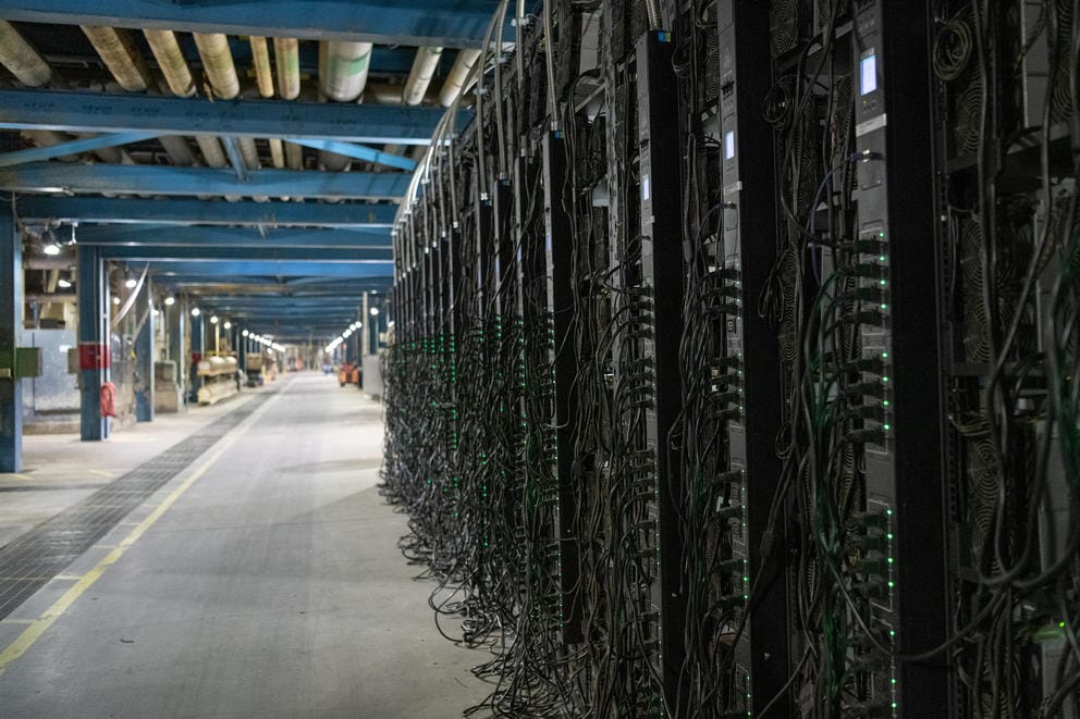 A long row of server machines inside a facility