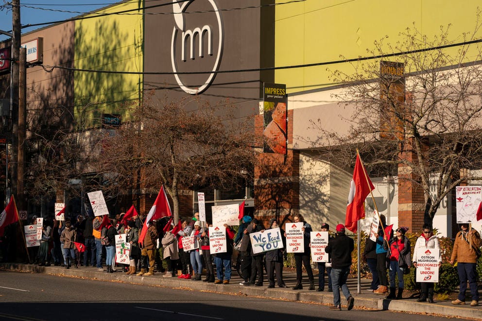 Demonstrators outside of Metropolitan Market