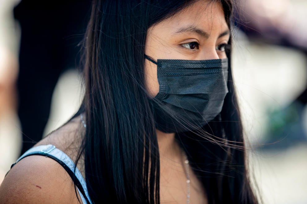 young woman with a mask