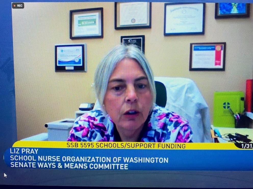 A screenshot of Liz Pray attending a virtual meeting for increased school funding.