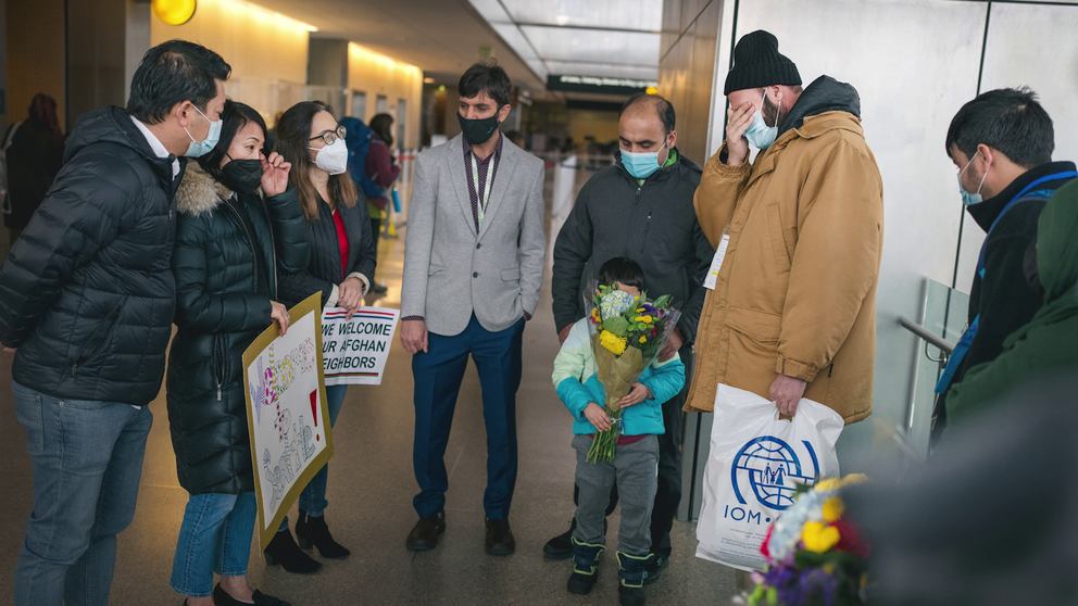 Mohammad’s family is greeted at the airport by their sponsors.