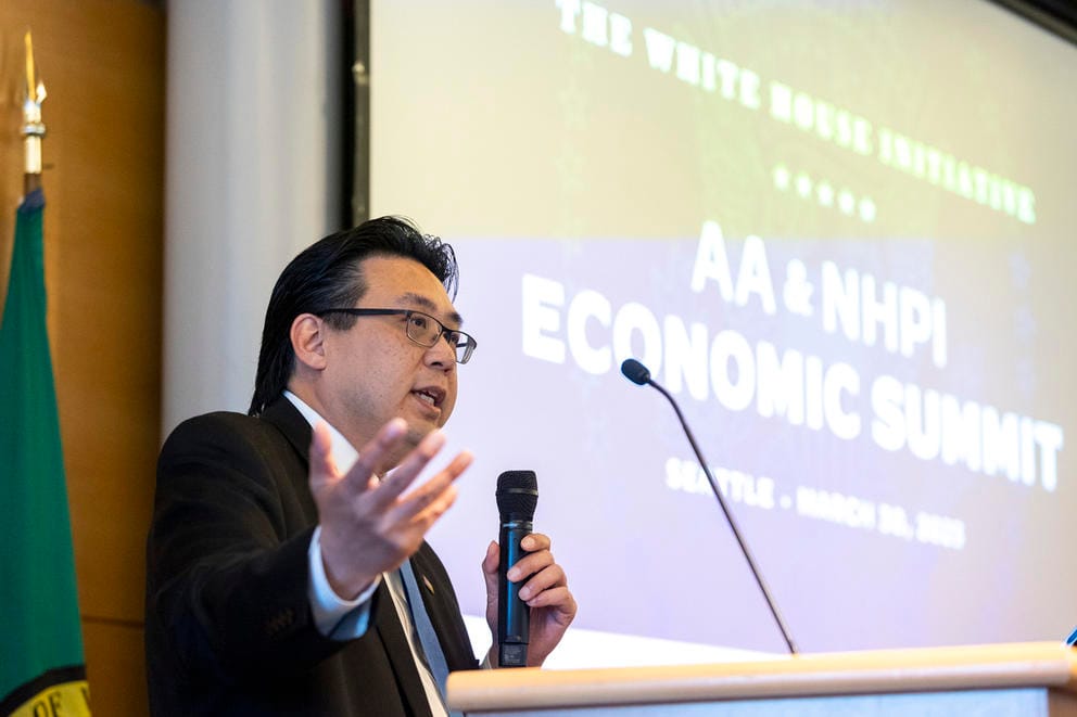 Michael Fong speaks into microphone
