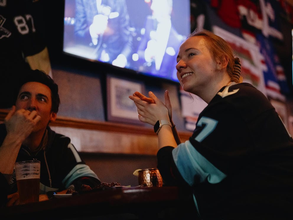 Kraken fans react to a Kraken goal against the Arizona Coyotes