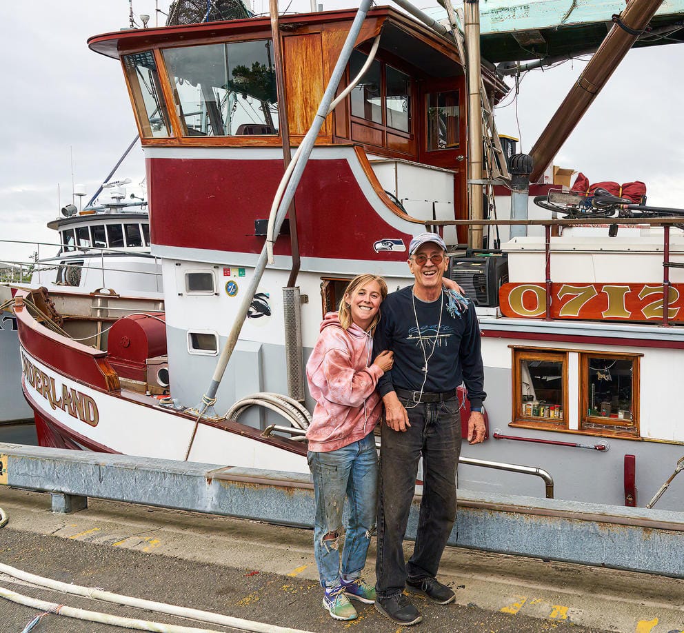 Camryn Patrick(left) with her Dad and Captain, Kevin Patrick alongside the FV Wonderland.