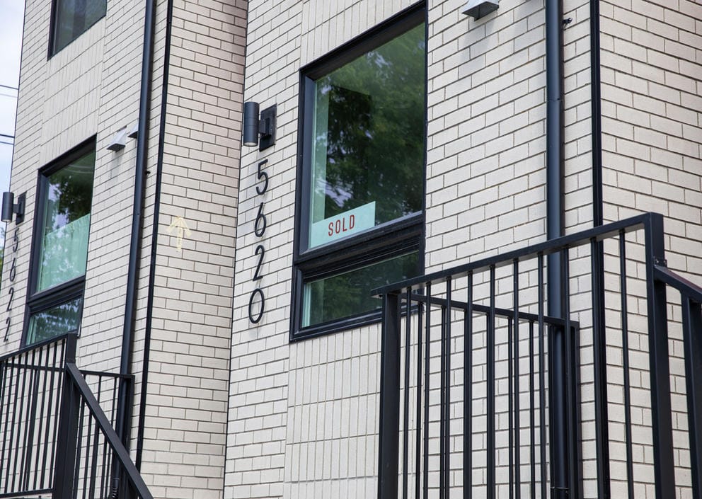 a close up of the window of a recently sold townhome