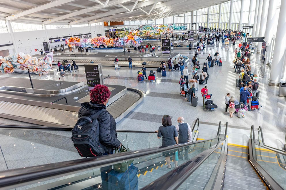 Crowded airport near baggage claim