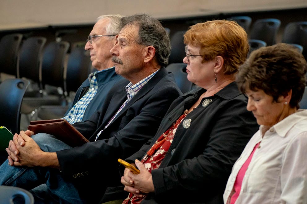 people listening to an Edmonds School Board meeting