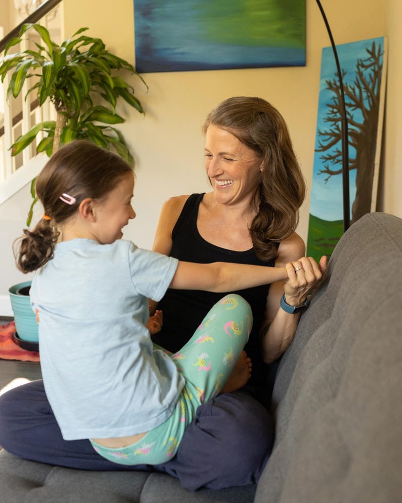 Former Harborview ICU nurse Nichole Leibov plays with her daughter