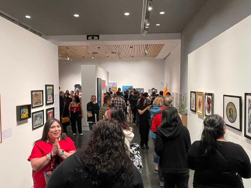 photo of a crowded art gallery