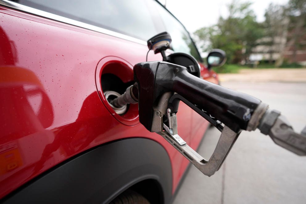 car at the gas pump