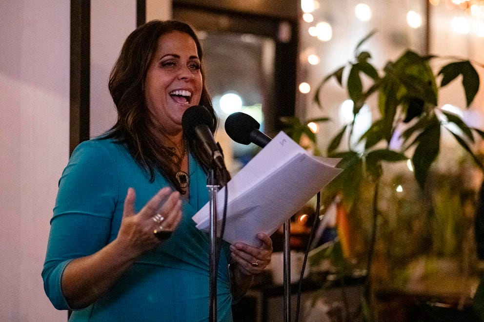 a woman gives a speech