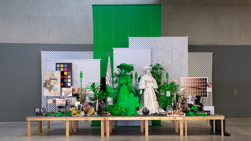A stage crowded with mannequins and memorbilia