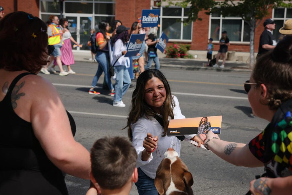 State Senate District 14 candidate Maria Beltran hands out campaign flyers