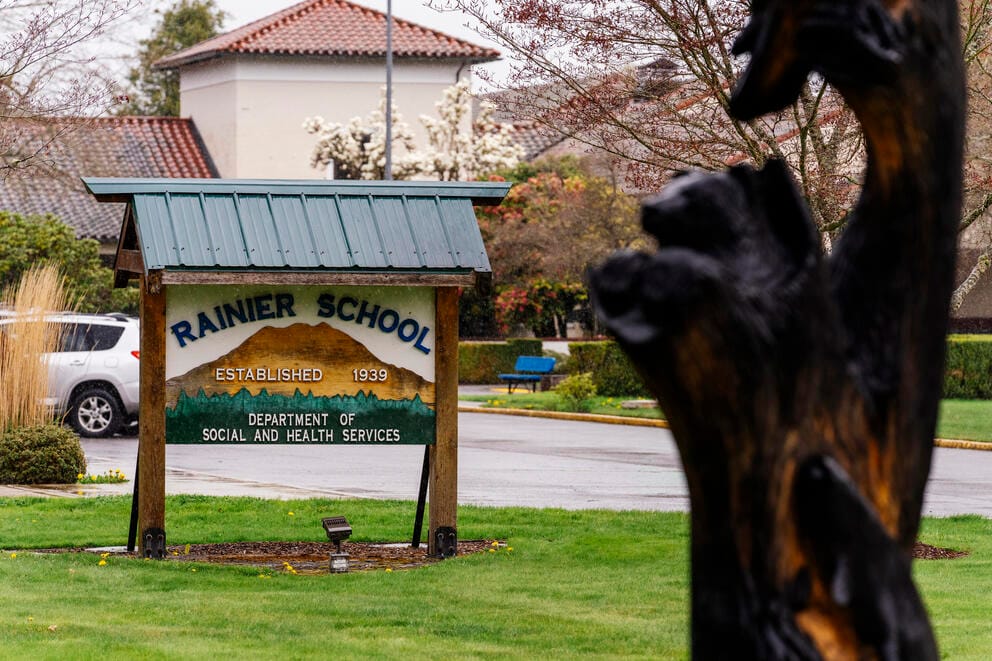 A sign for Rainier School