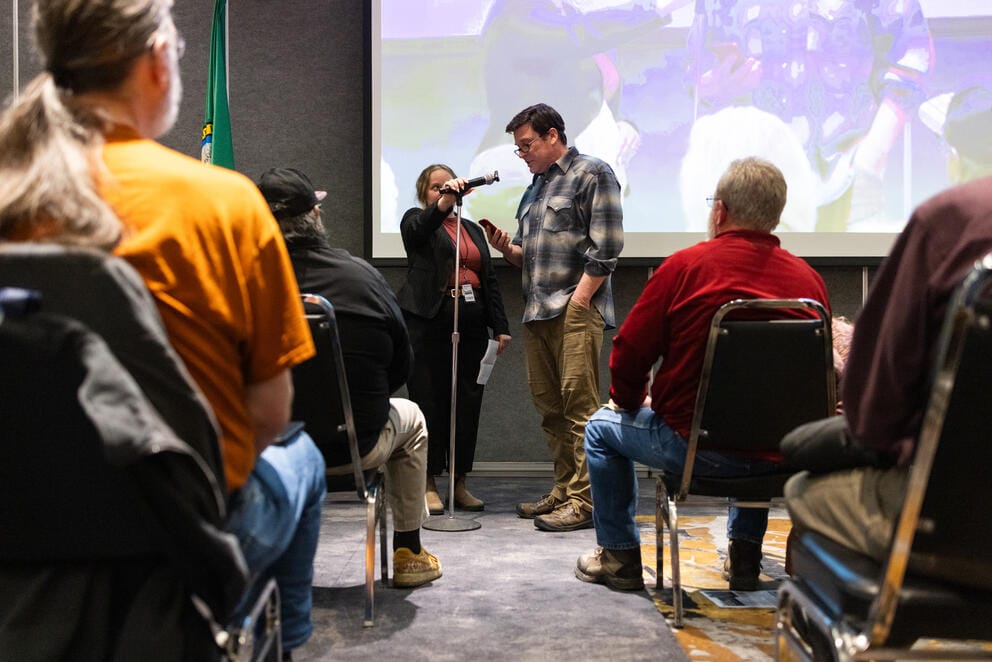 Dan Peters, president of the Selah School Board, speaks during a town hall
