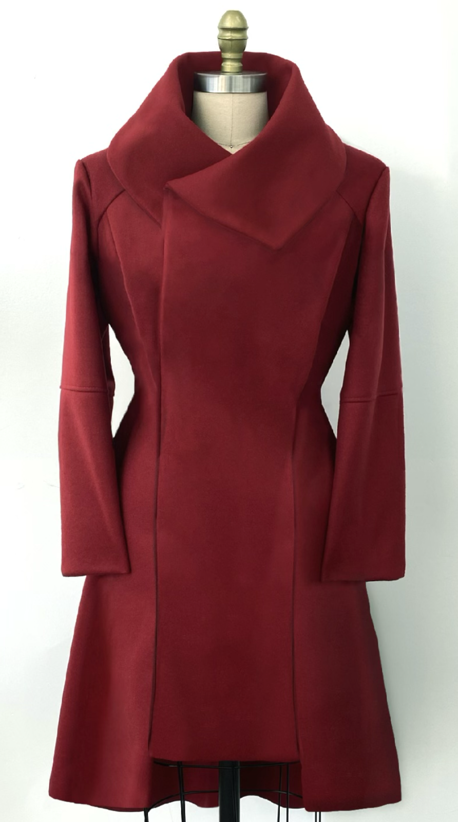 A long red coat with a high collar