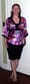 What she's wearing: a kimono-inspired top