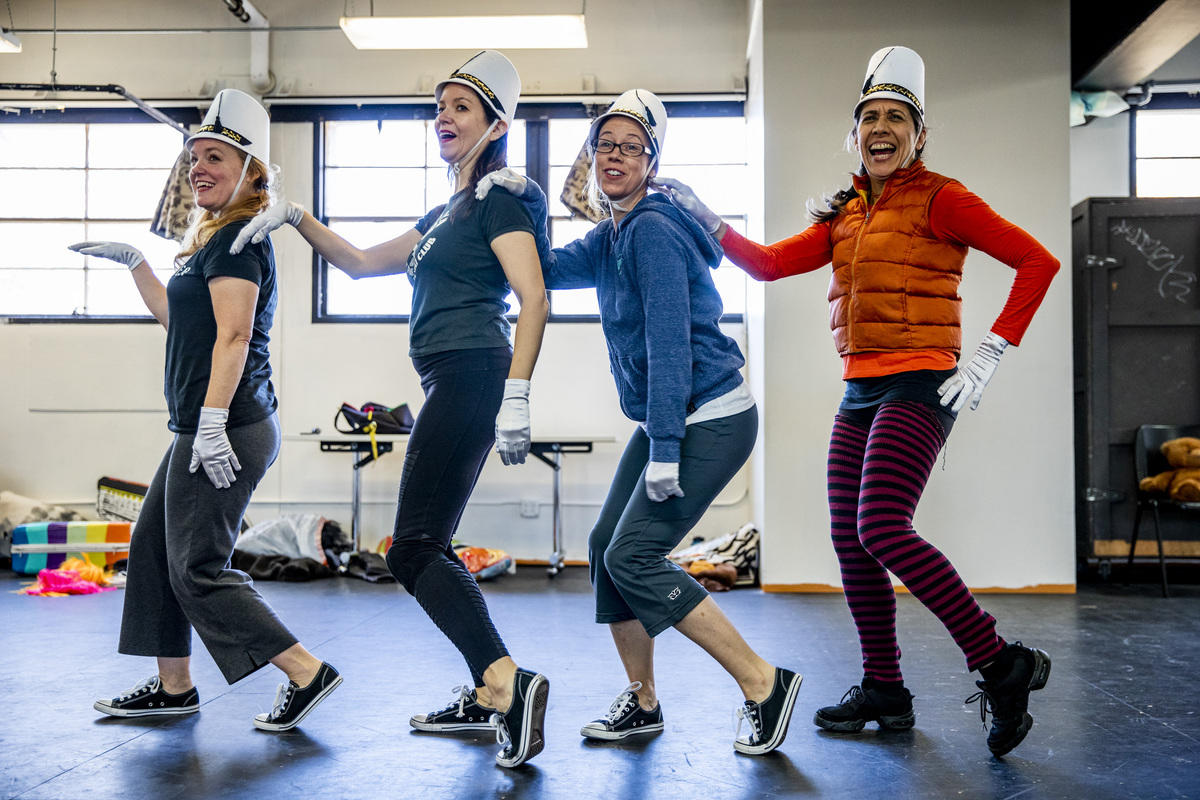 Four dancers practicing